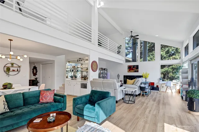 a living room with furniture and a table