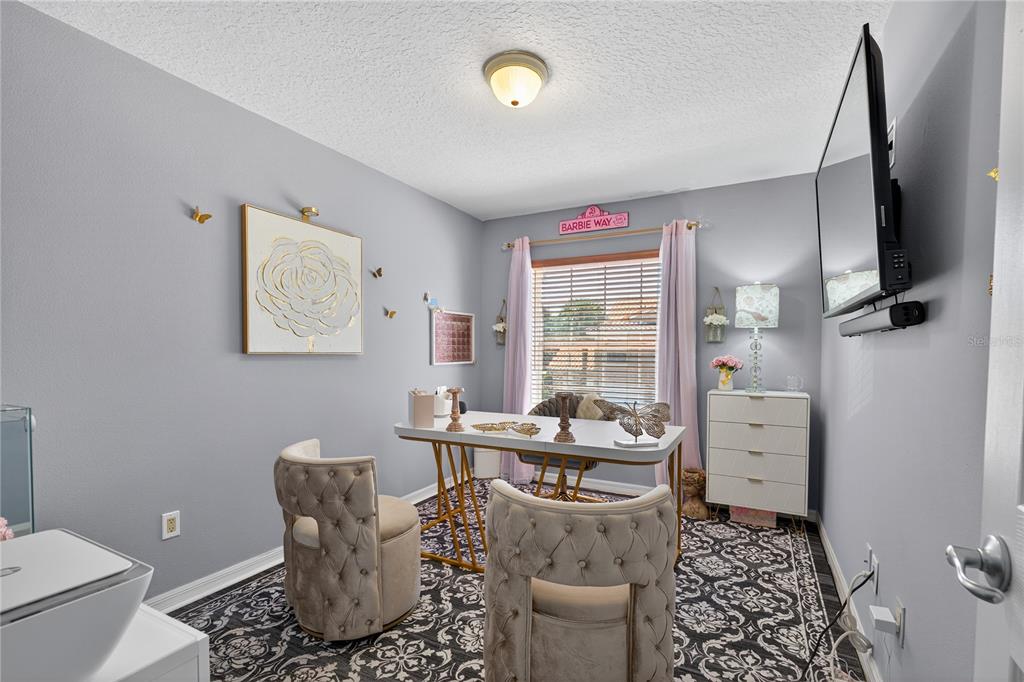 5336 Edgewater Way Oxford, FL 34484 - Photo 13 of 45 a room with furniture and a window