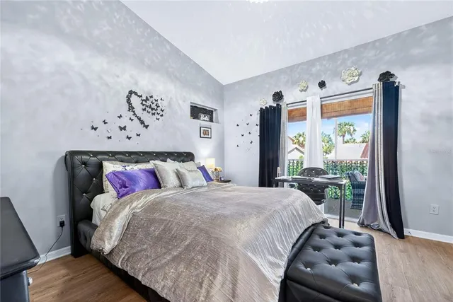 a spacious bathroom with a double vanity sink and a mirror