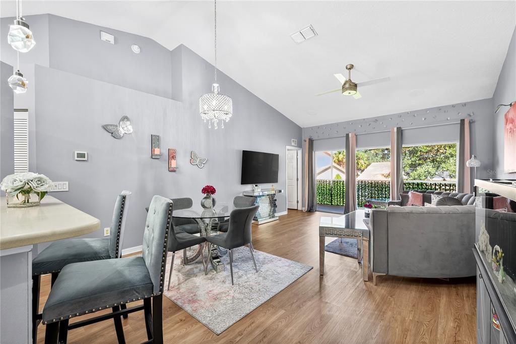 5336 Edgewater Way Oxford, FL 34484 - Photo 7 of 45 a living room with furniture and wooden floor