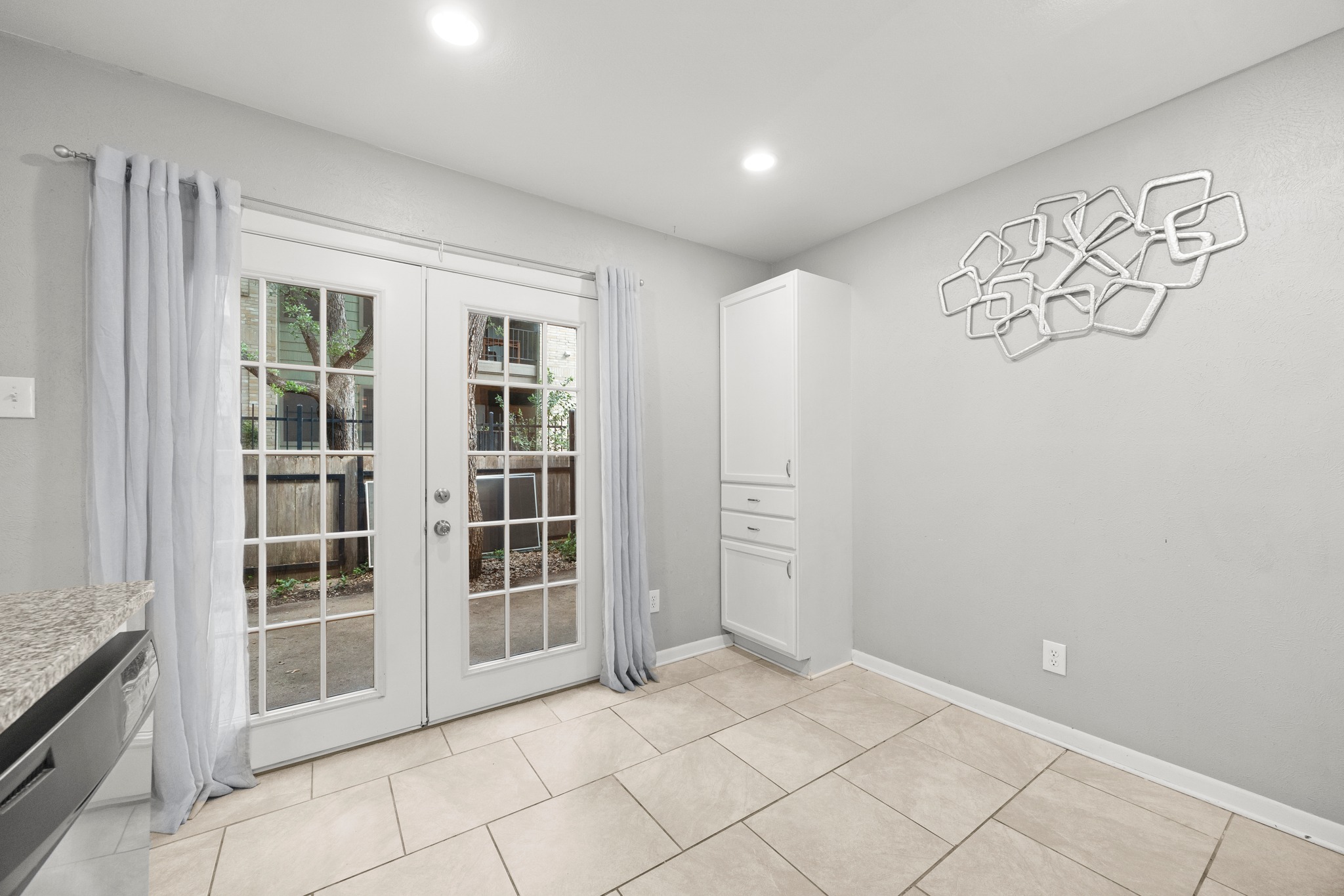 8330 Fathom Circle, Unit 501 Austin, TX 78750 - Photo 10 of 26 a view of an empty room with a window