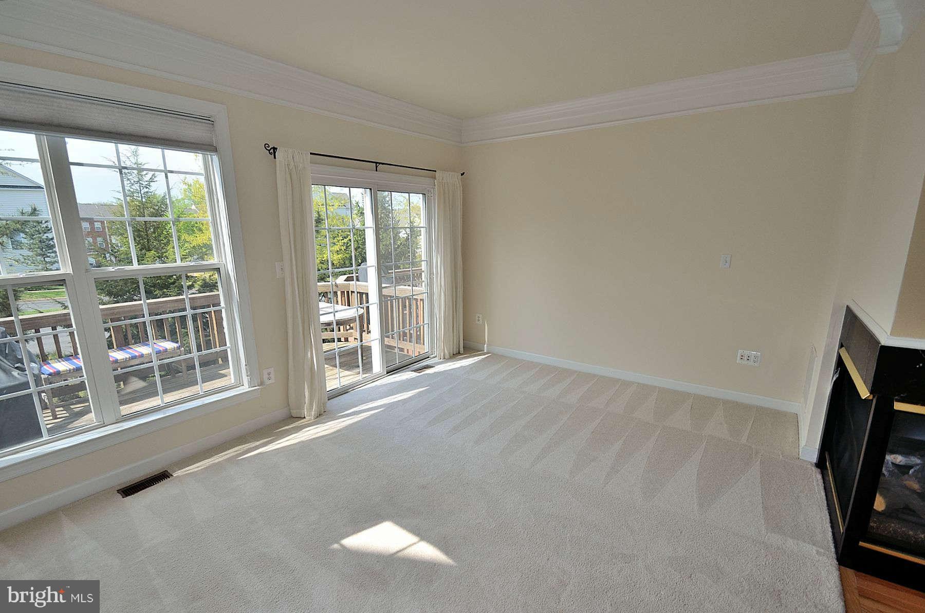 11459 Log Ridge Drive Fairfax, VA 22030 - Photo 2 of 18 Sun-Drenched Living Room Leads to Deck!