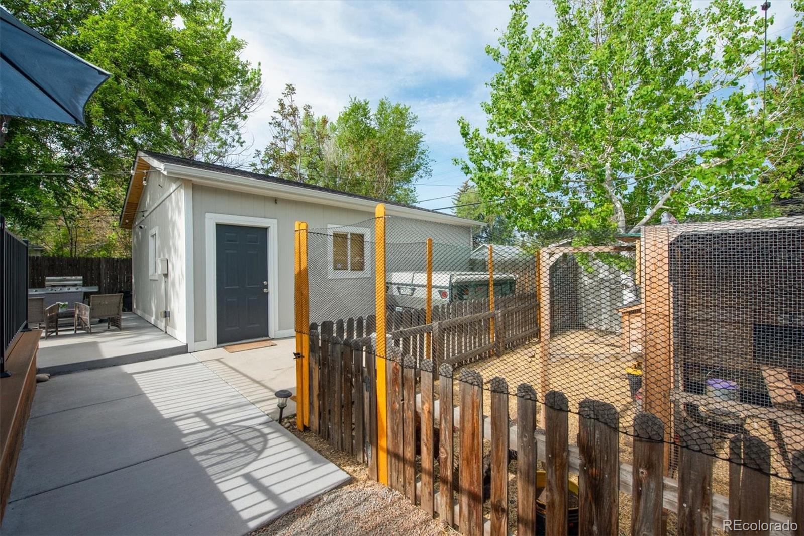 4335 Zenobia Street Denver, CO 80212 - Photo 20 of 26 a view of a house with a patio