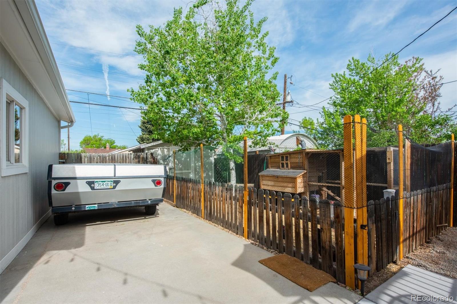 4335 Zenobia Street Denver, CO 80212 - Photo 21 of 26 a view of a car park in front of a house
