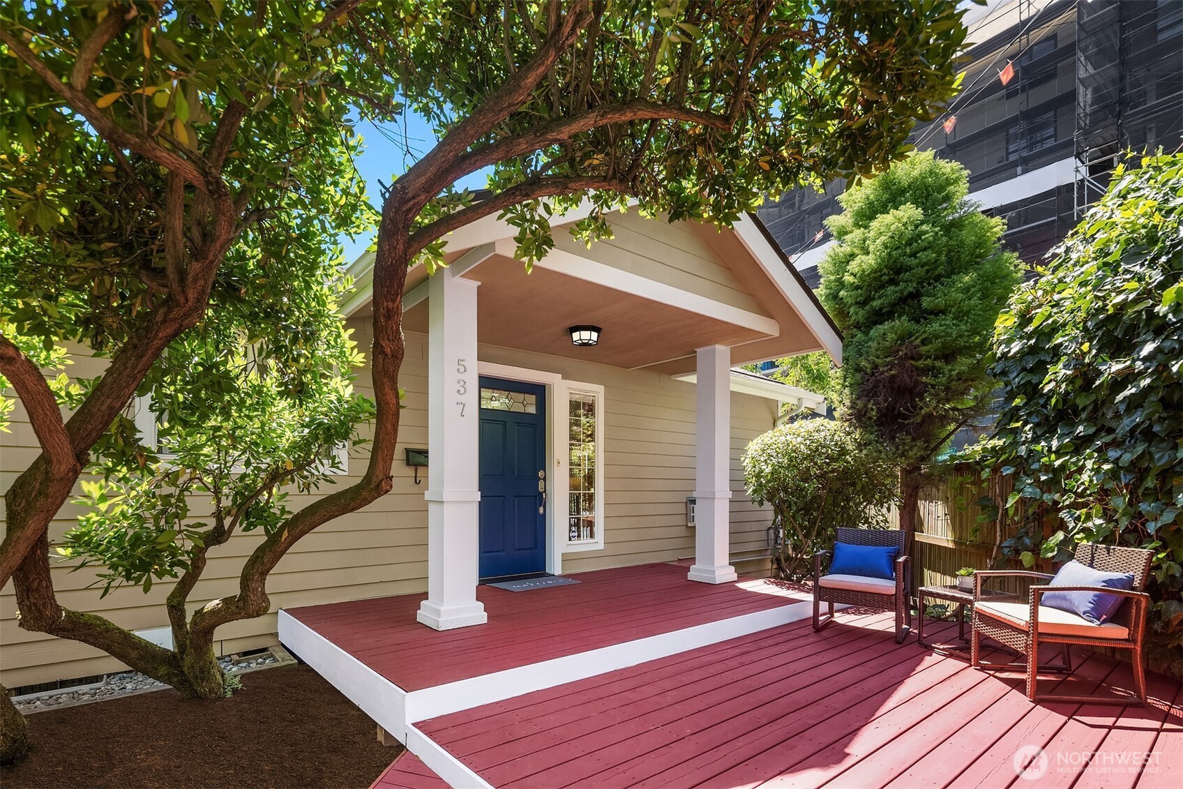 537 30th Avenue East Seattle, WA 98112 - Photo 1 of 25 a view of house with patio entertaining space with furniture and wooden floor