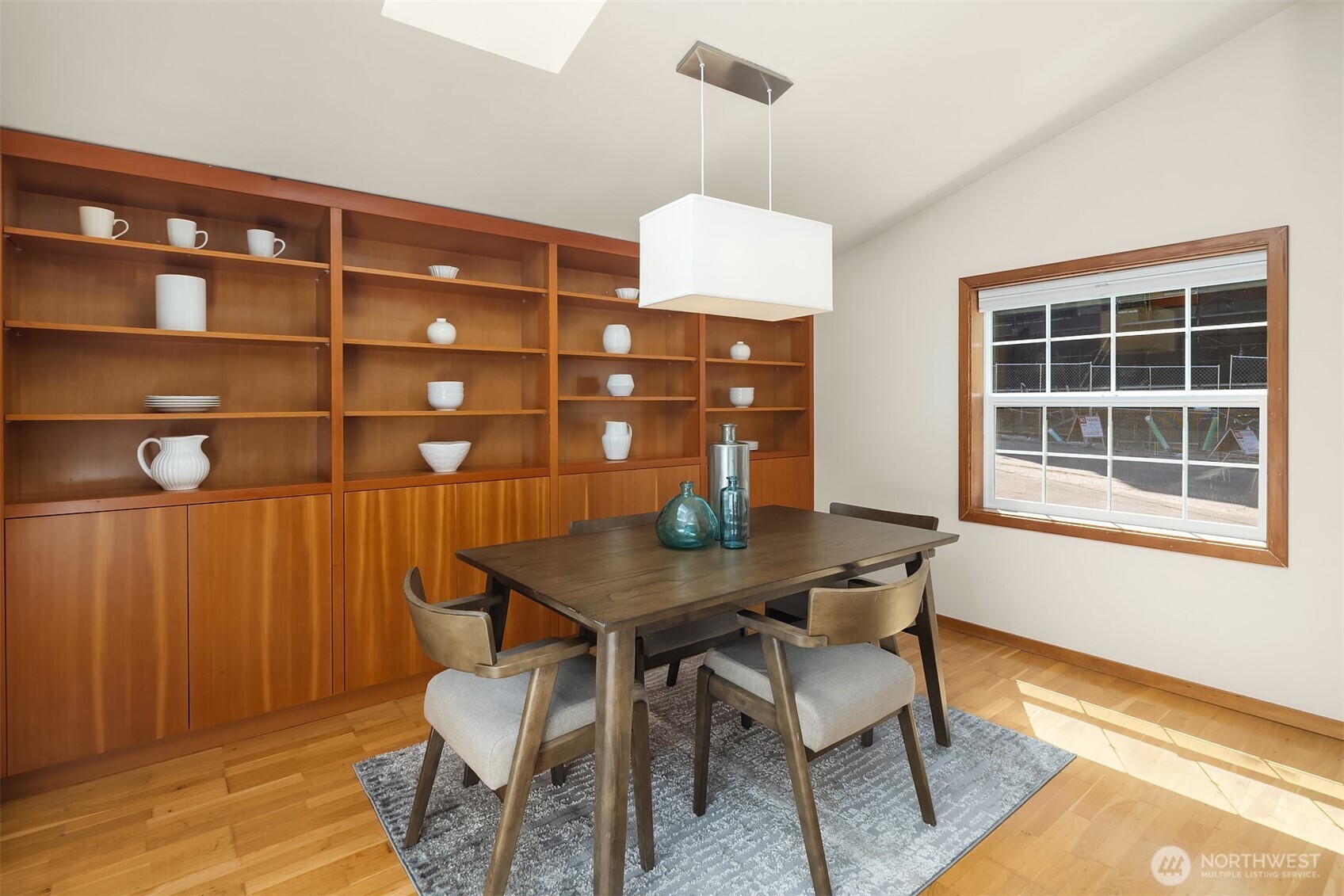 537 30th Avenue East Seattle, WA 98112 - Photo 12 of 25 a view of a dining room with furniture and wooden floor