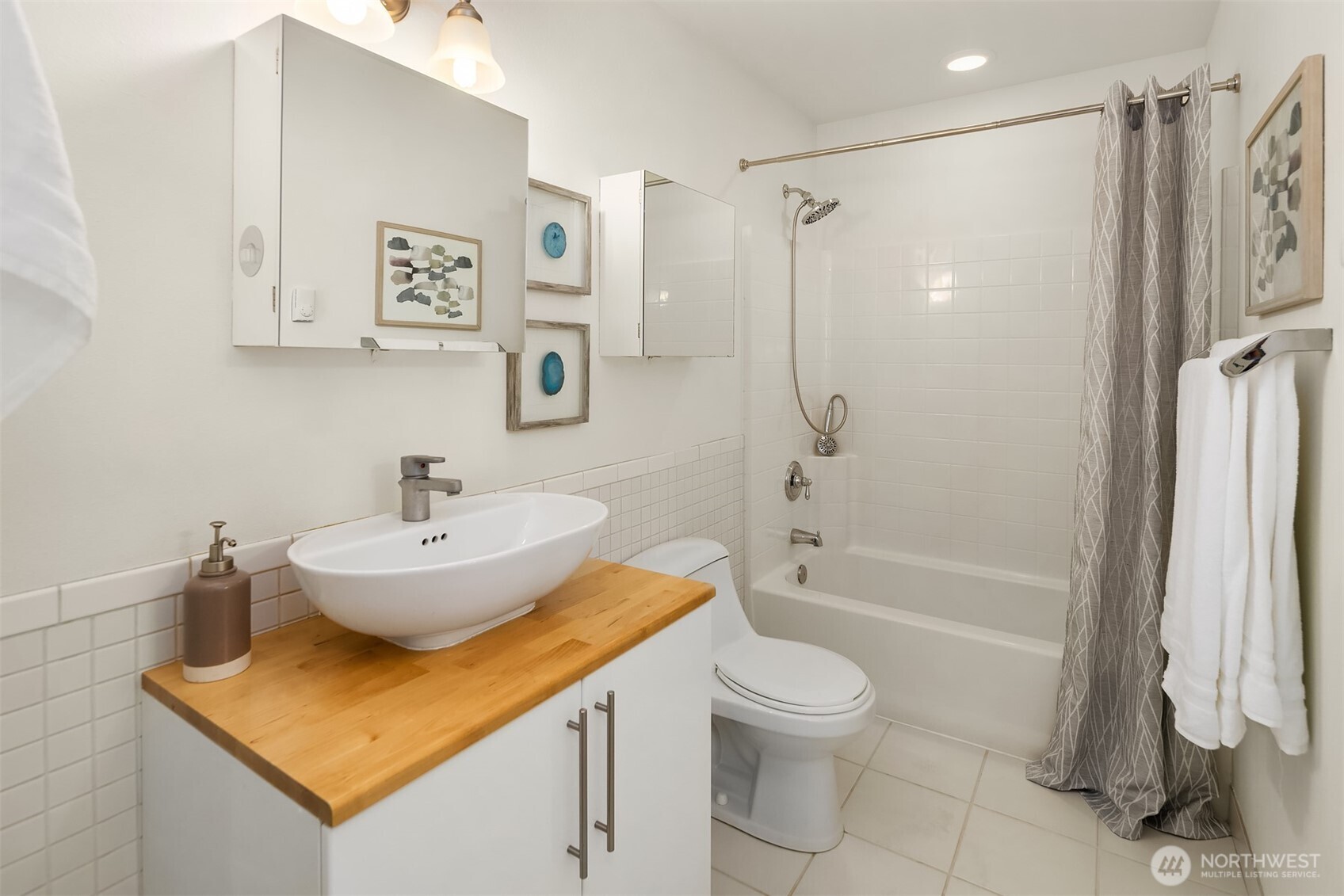 537 30th Avenue East Seattle, WA 98112 - Photo 15 of 25 a bathroom with a sink a toilet and a bathtub