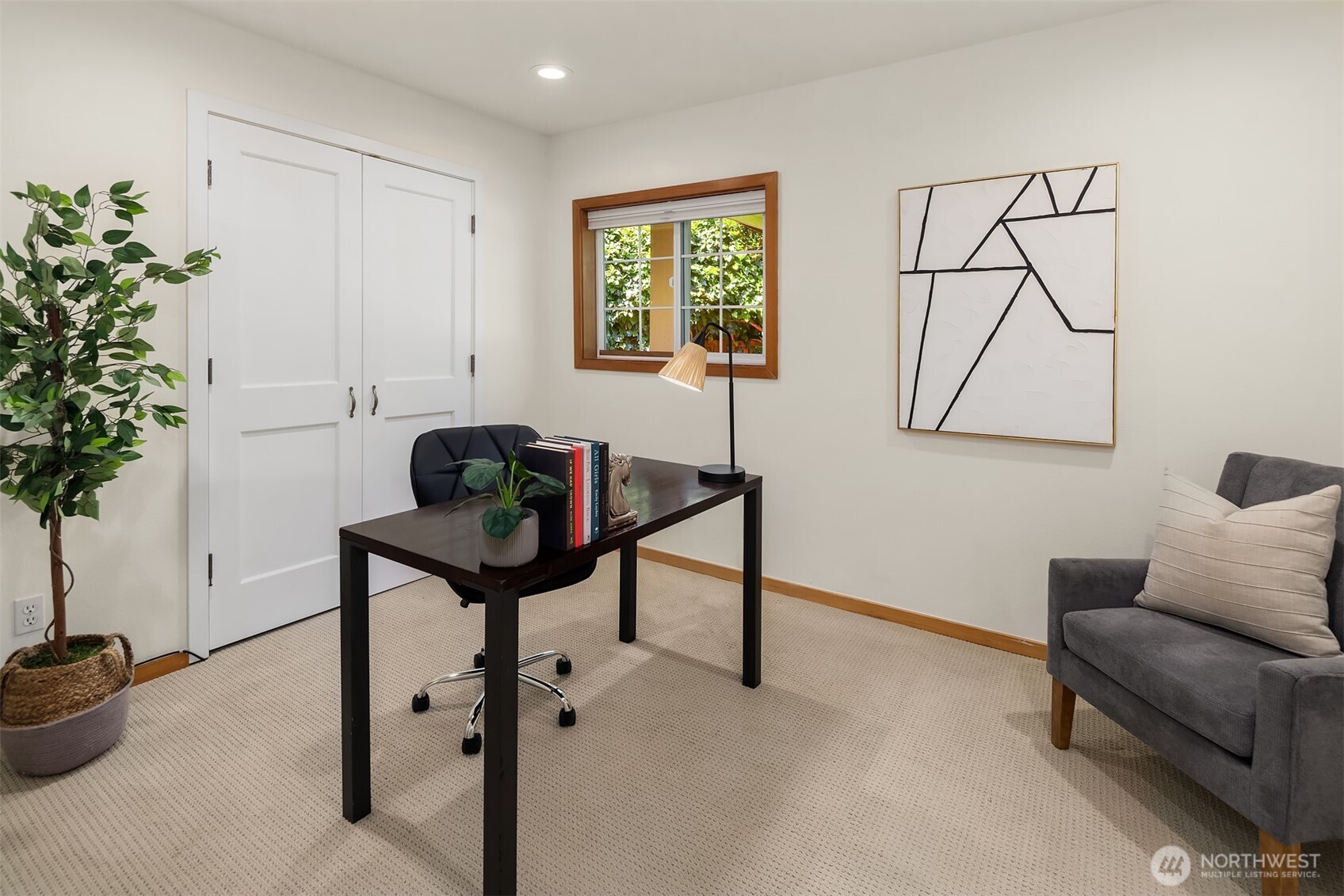 537 30th Avenue East Seattle, WA 98112 - Photo 16 of 25 a living room with furniture and a potted plant