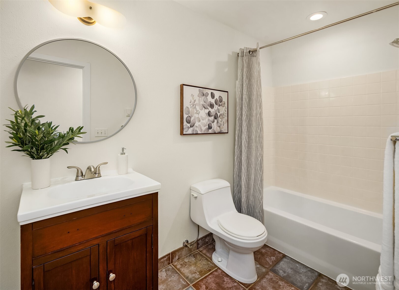 537 30th Avenue East Seattle, WA 98112 - Photo 18 of 25 a bathroom with a sink a toilet and shower
