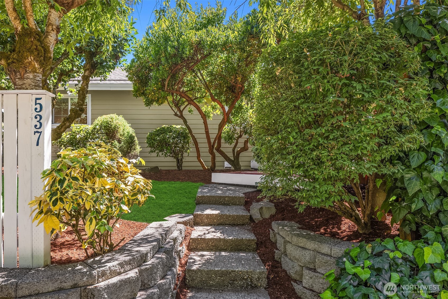 537 30th Avenue East Seattle, WA 98112 - Photo 24 of 25 a view of a garden with plants