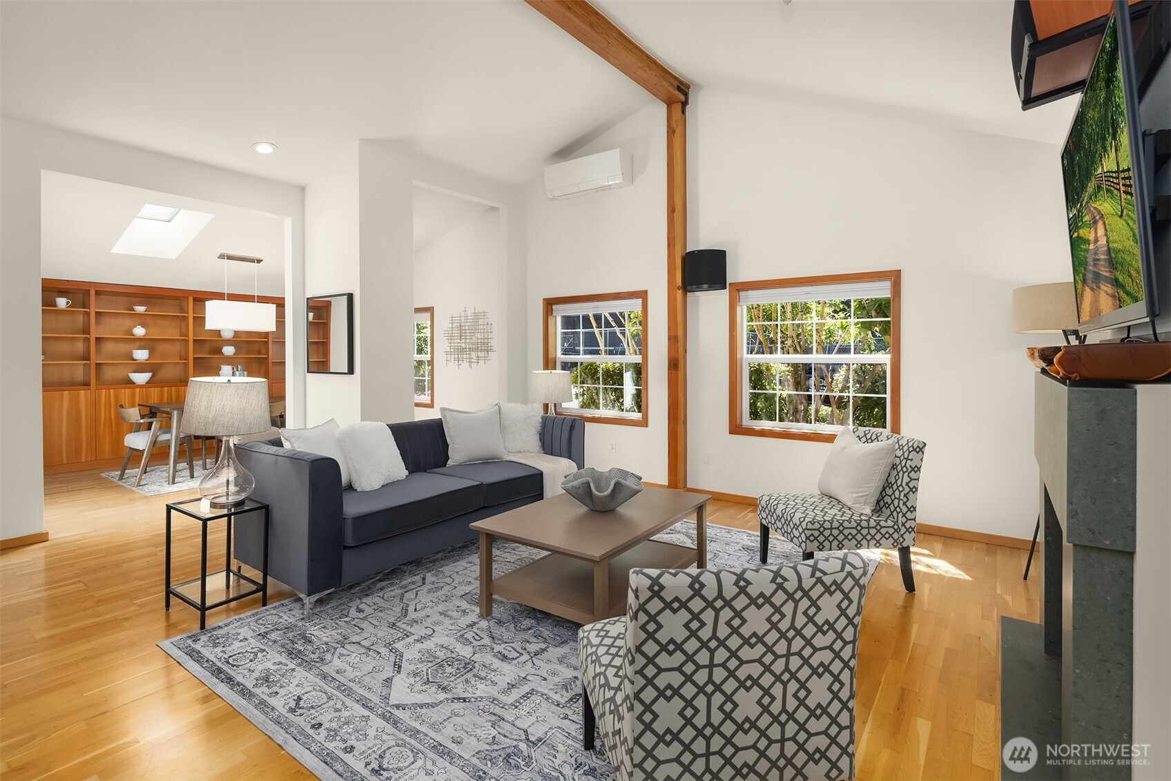 537 30th Avenue East Seattle, WA 98112 - Photo 6 of 25 a living room with furniture and a flat screen tv