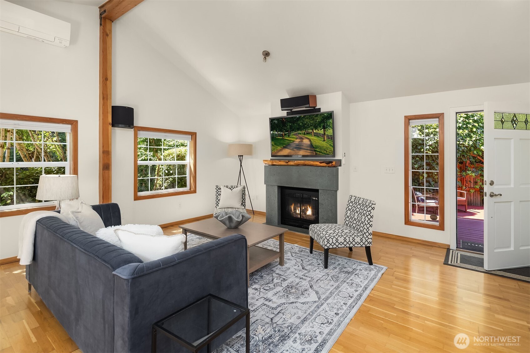 537 30th Avenue East Seattle, WA 98112 - Photo 8 of 25 a living room with furniture and a fireplace