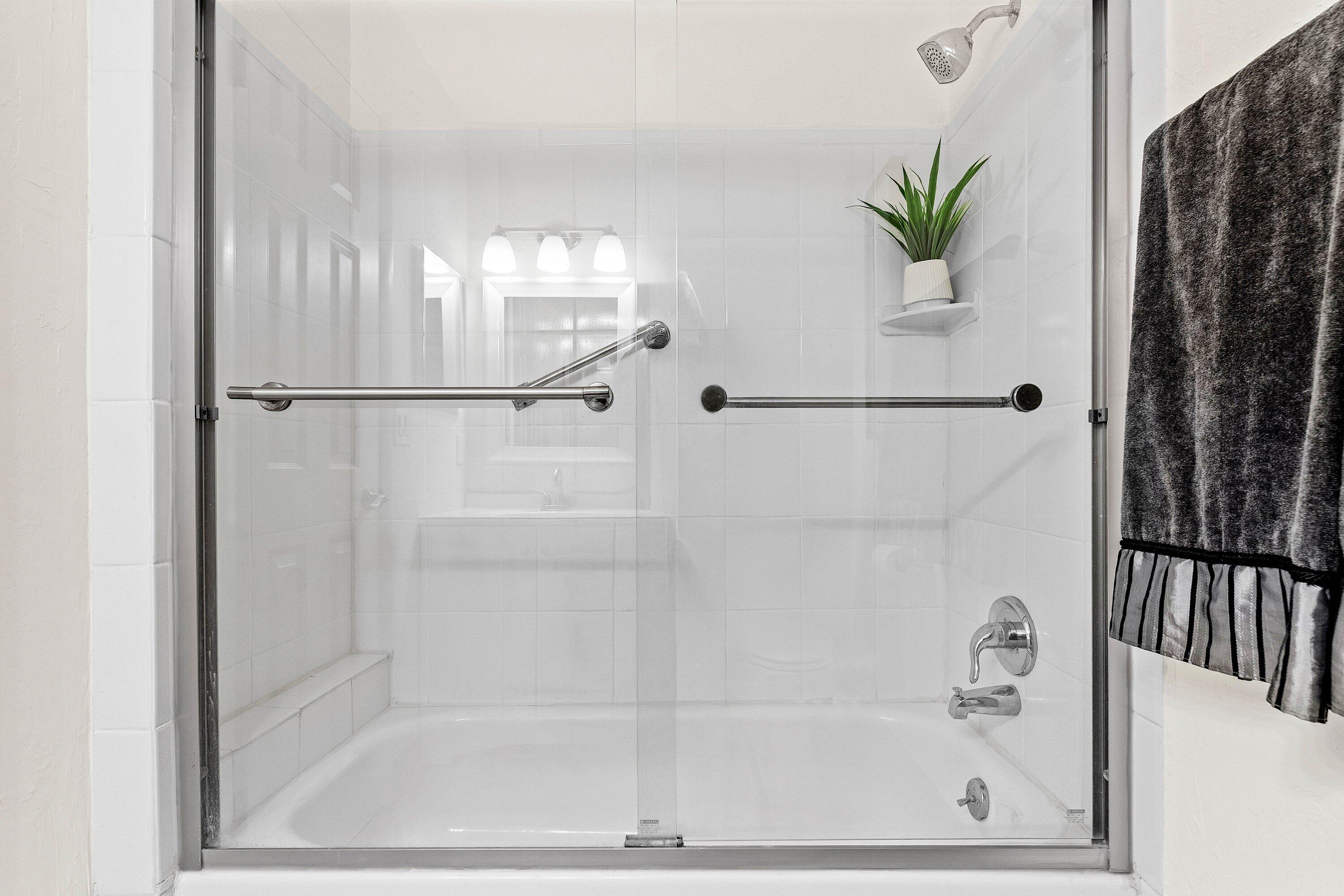 13899 Via Aurora, Unit C Delray Beach, FL 33484 - Photo 27 of 39 a bathroom with a shower