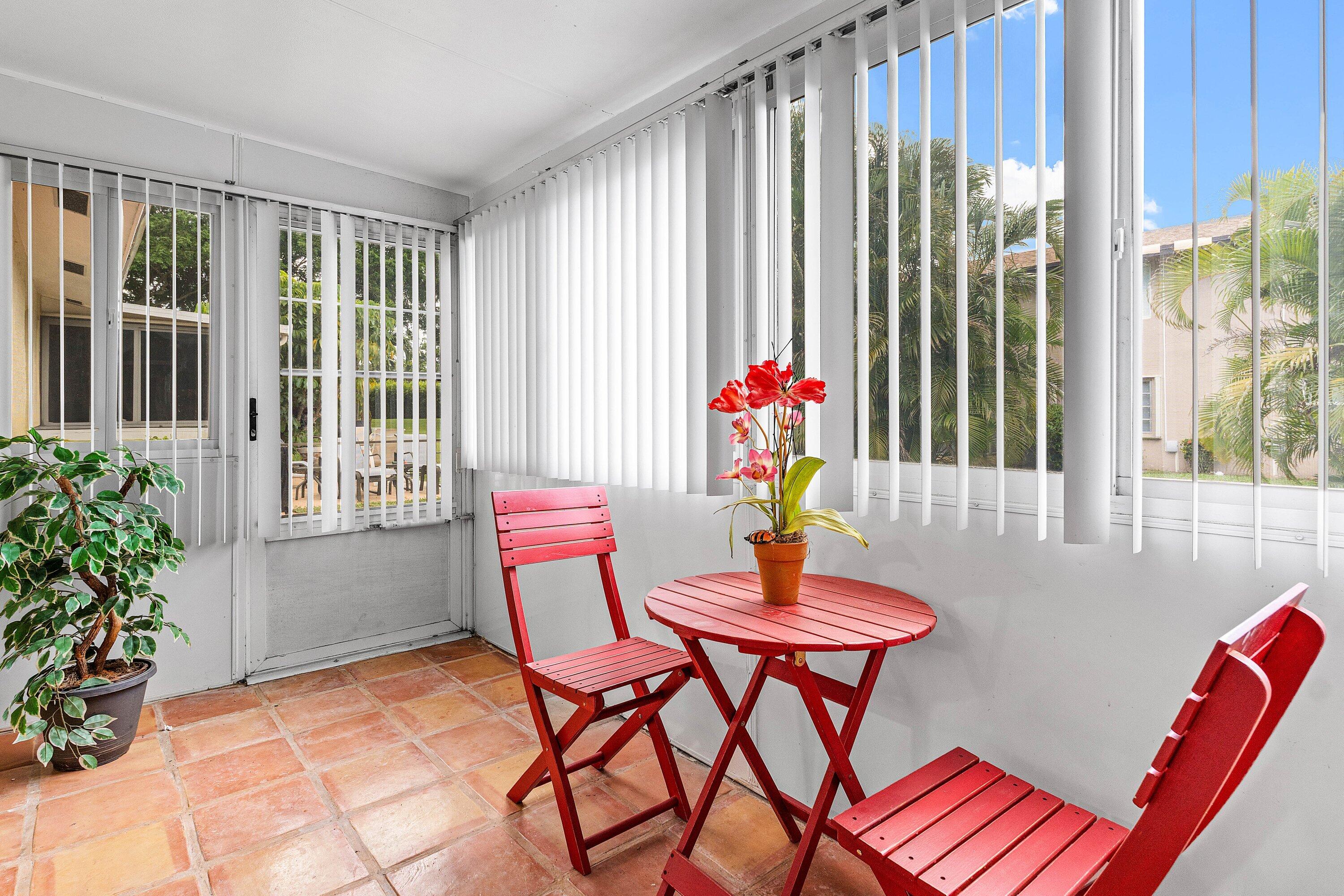 13899 Via Aurora, Unit C Delray Beach, FL 33484 - Photo 30 of 39 a outdoor dining space with furniture and outdoor view