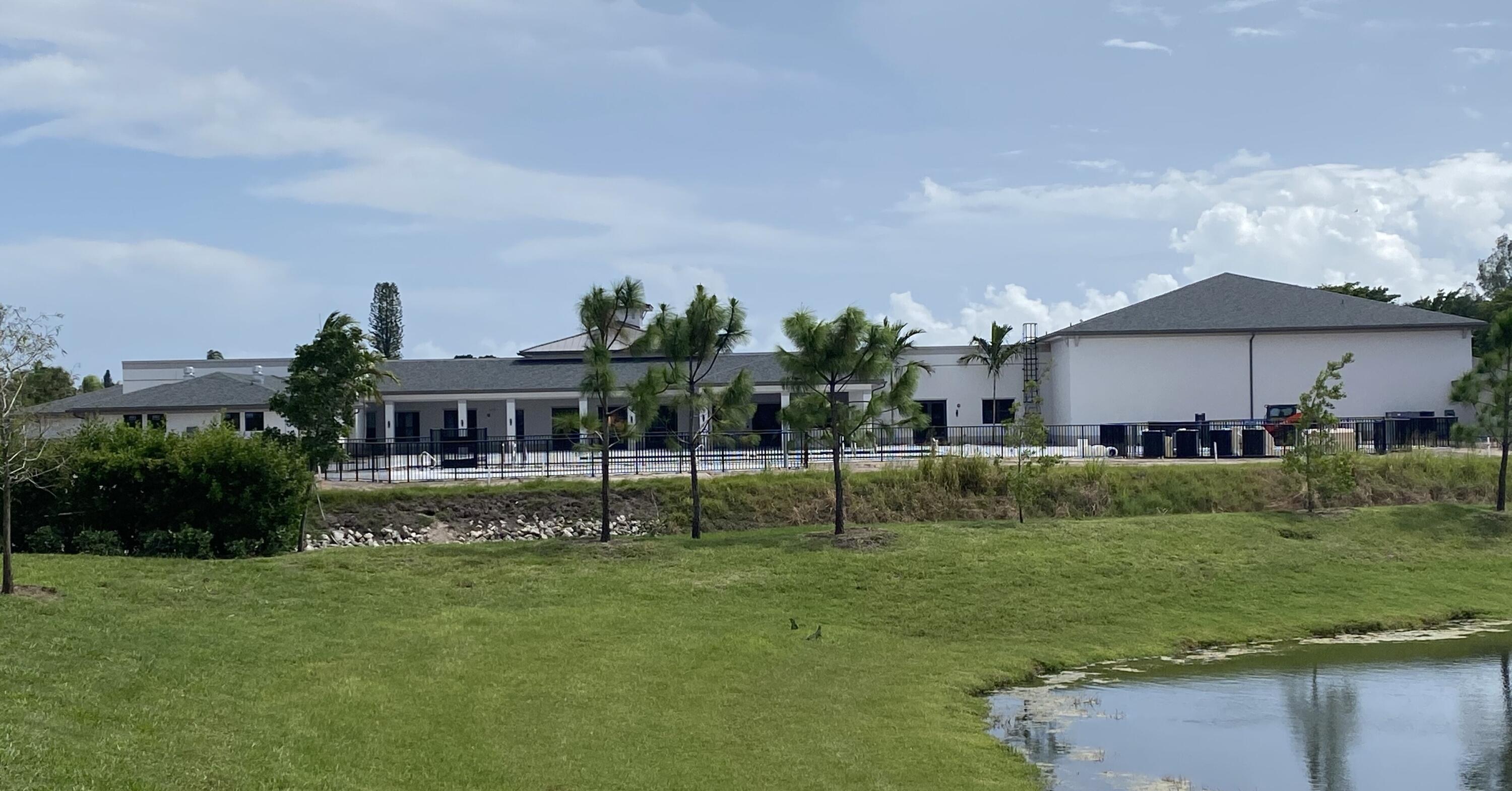 13899 Via Aurora, Unit C Delray Beach, FL 33484 - Photo 36 of 39 a view of outdoor space and yard