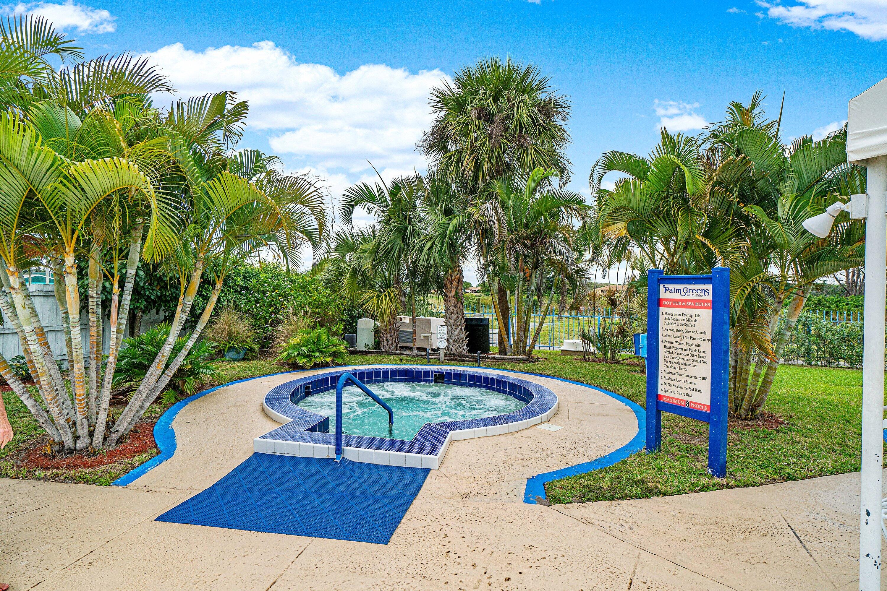 13899 Via Aurora, Unit C Delray Beach, FL 33484 - Photo 39 of 39 a swimming pool with yard