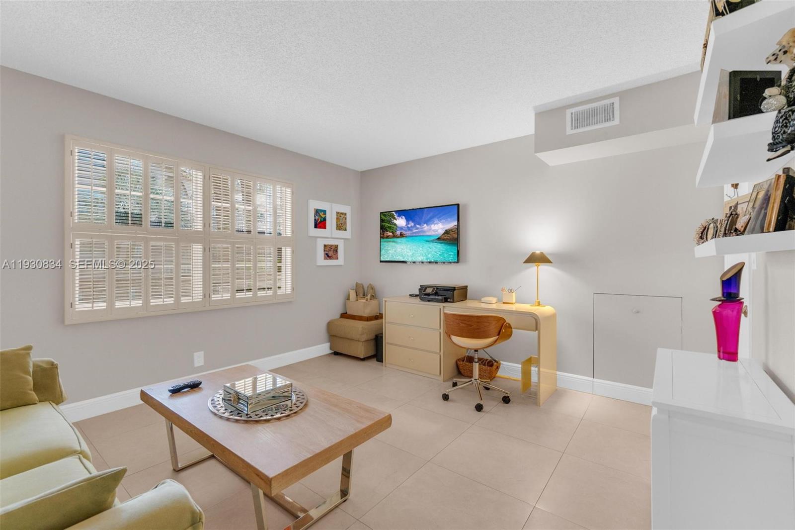 4402 Martinique Court, Unit K2 Coconut Creek, FL 33066 - Photo 23 of 38 a living room with furniture and next to a window