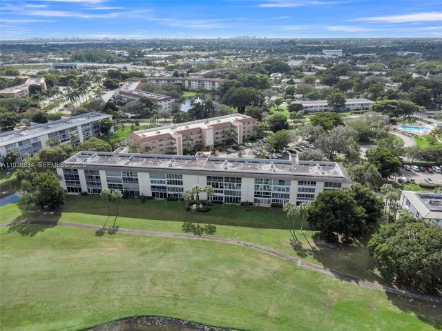 an aerial view of a house with a garden