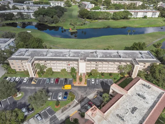 an aerial view of a house with a garden