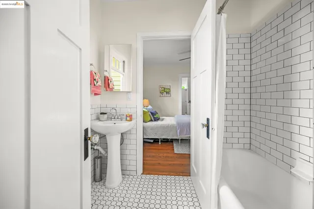 a bedroom with a bed and a cabinets