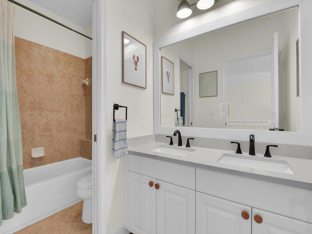 7851 Founders Circle Naples, FL 34104 - Photo 31 of 43 a bathroom with a sink and a bathtub