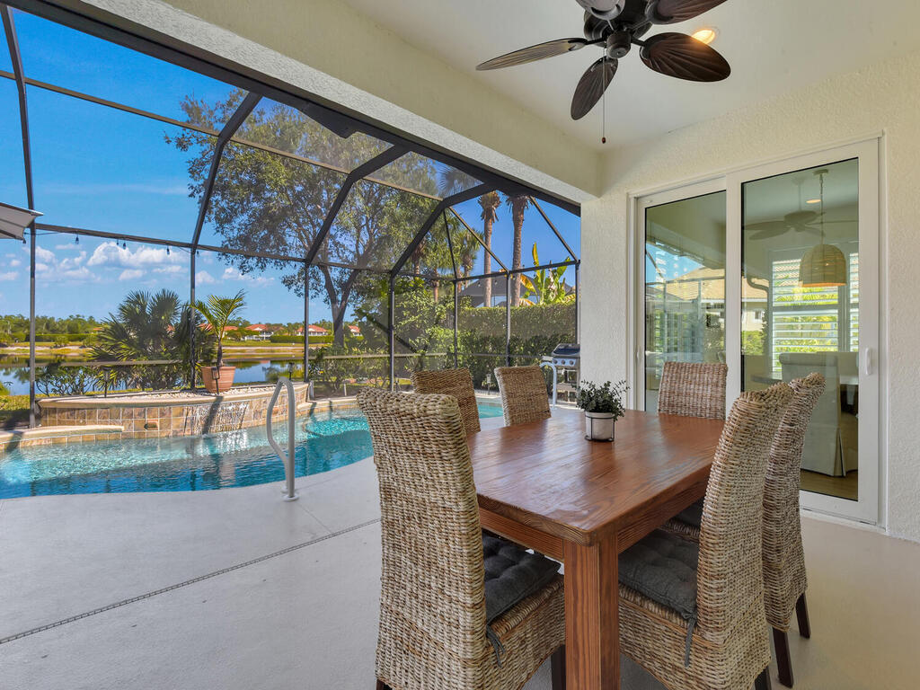 7851 Founders Circle Naples, FL 34104 - Photo 34 of 43 a view of a dining room with furniture window and outside view