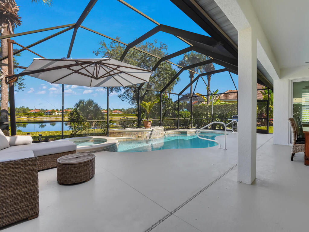 7851 Founders Circle Naples, FL 34104 - Photo 37 of 43 a view of pool with seating area