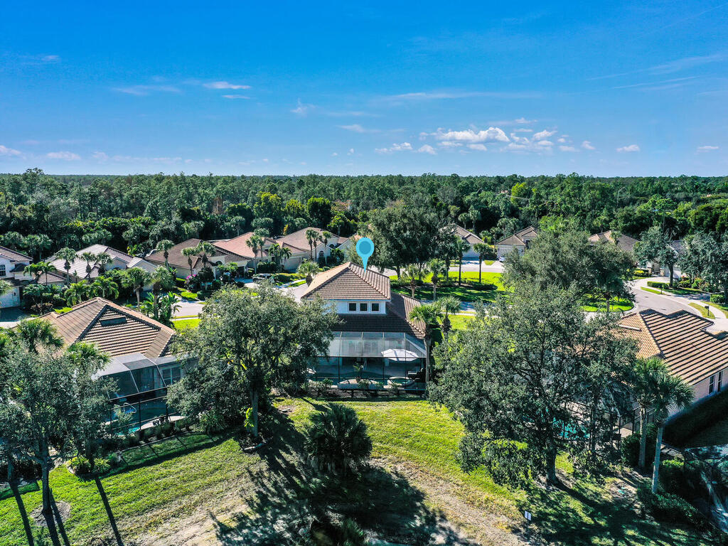 7851 Founders Circle Naples, FL 34104 - Photo 43 of 43 a aerial view of a house with a garden