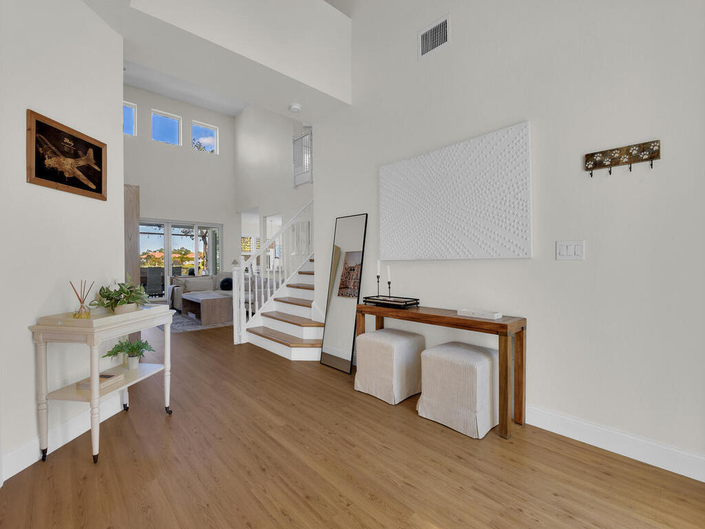 7851 Founders Circle Naples, FL 34104 - Photo 6 of 43 a view of living room with furniture and wooden floor