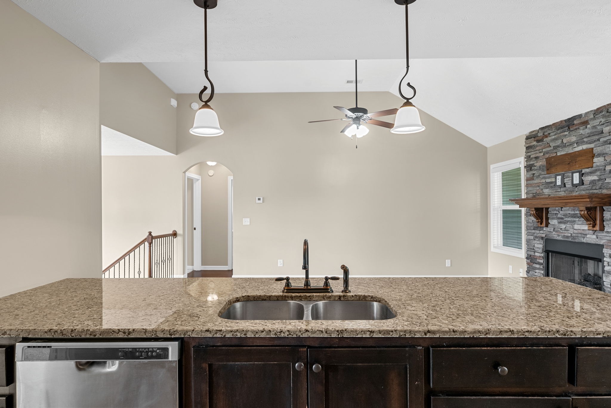 1227 Brigade Drive Clarksville, TN 37043 - Photo 11 of 39 a kitchen with granite countertop a sink a counter space cabinets and stainless steel appliances