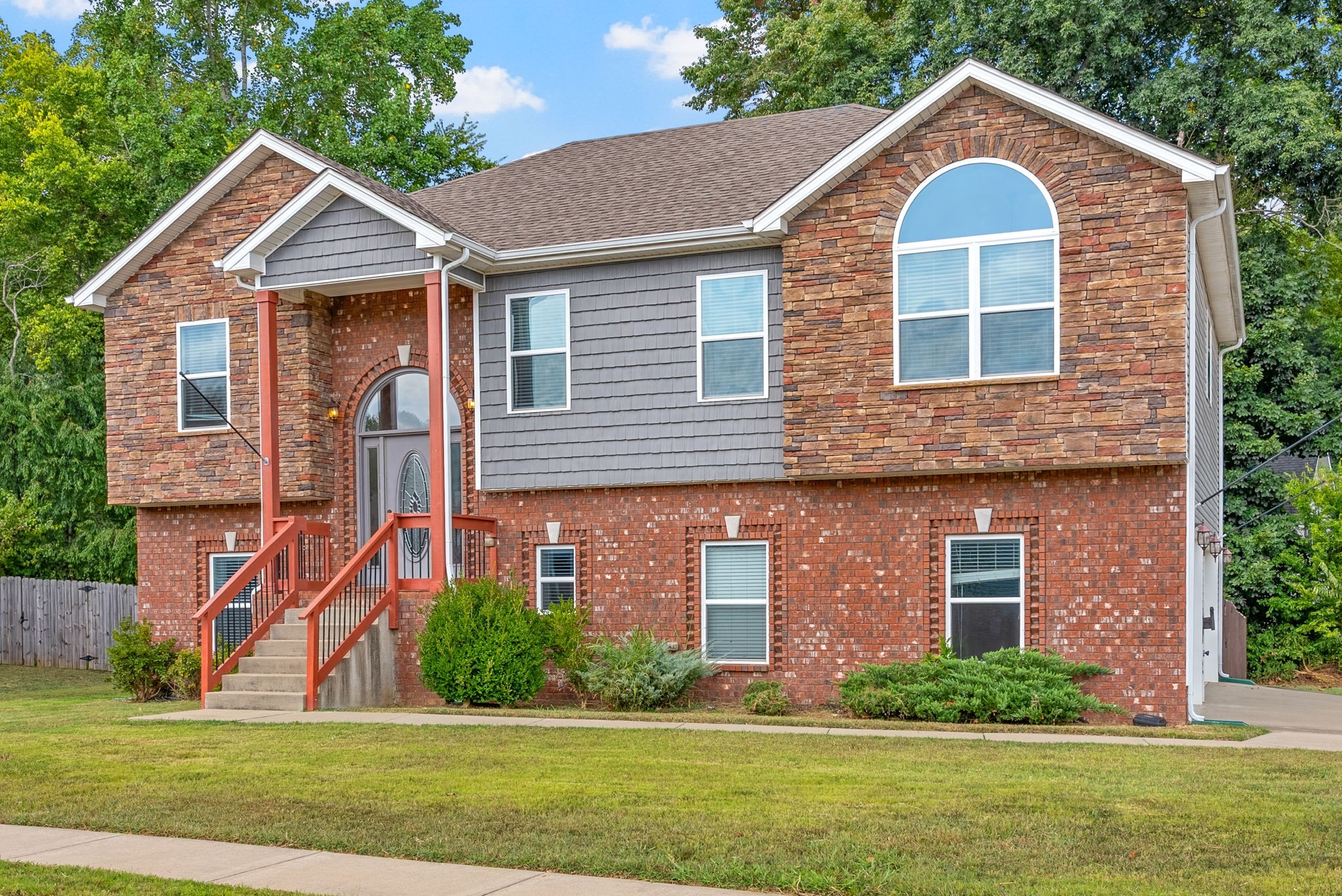 1227 Brigade Drive Clarksville, TN 37043 - Photo 2 of 39 a front view of a house with a yard