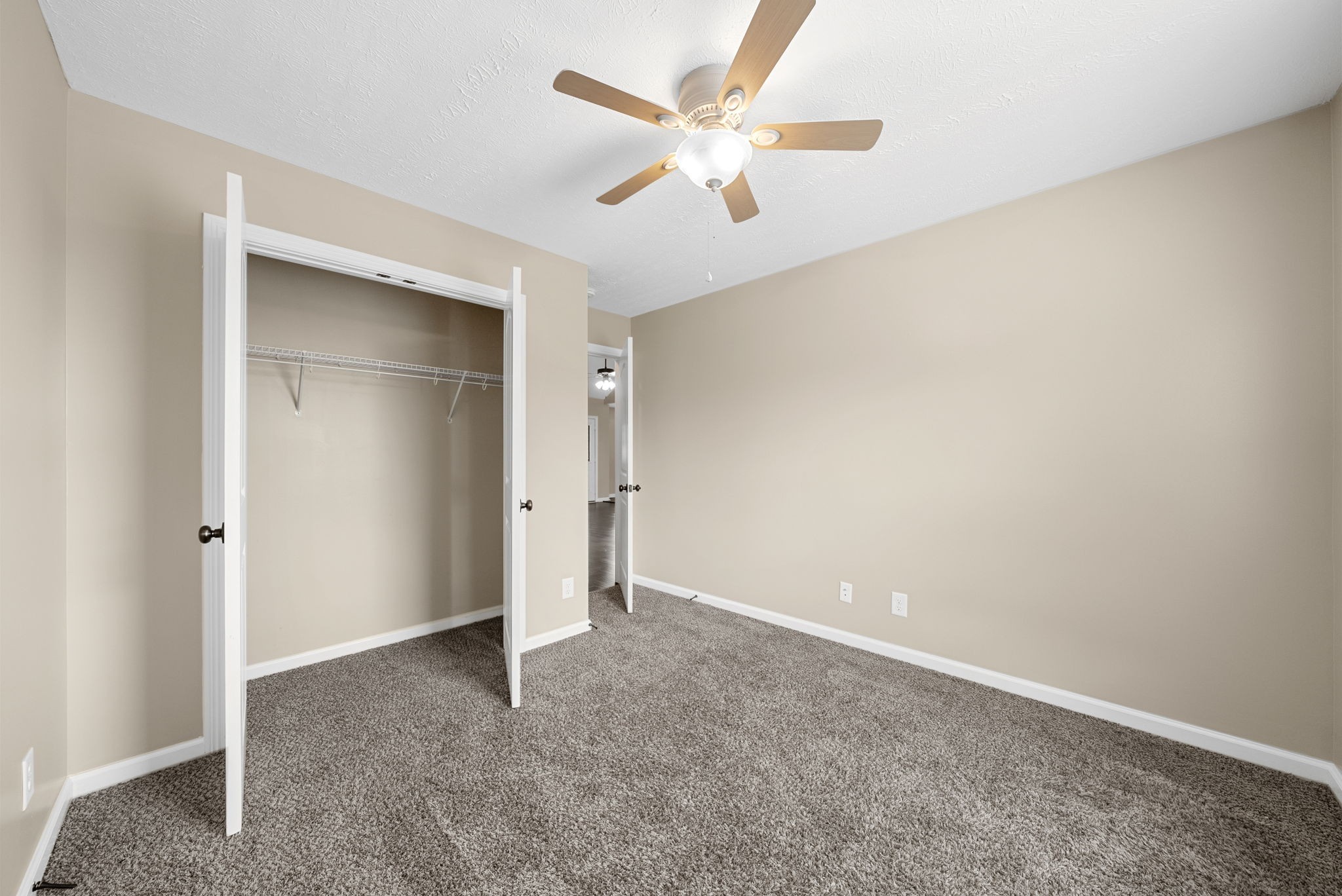 1227 Brigade Drive Clarksville, TN 37043 - Photo 22 of 39 an empty room with closet and a ceiling fan