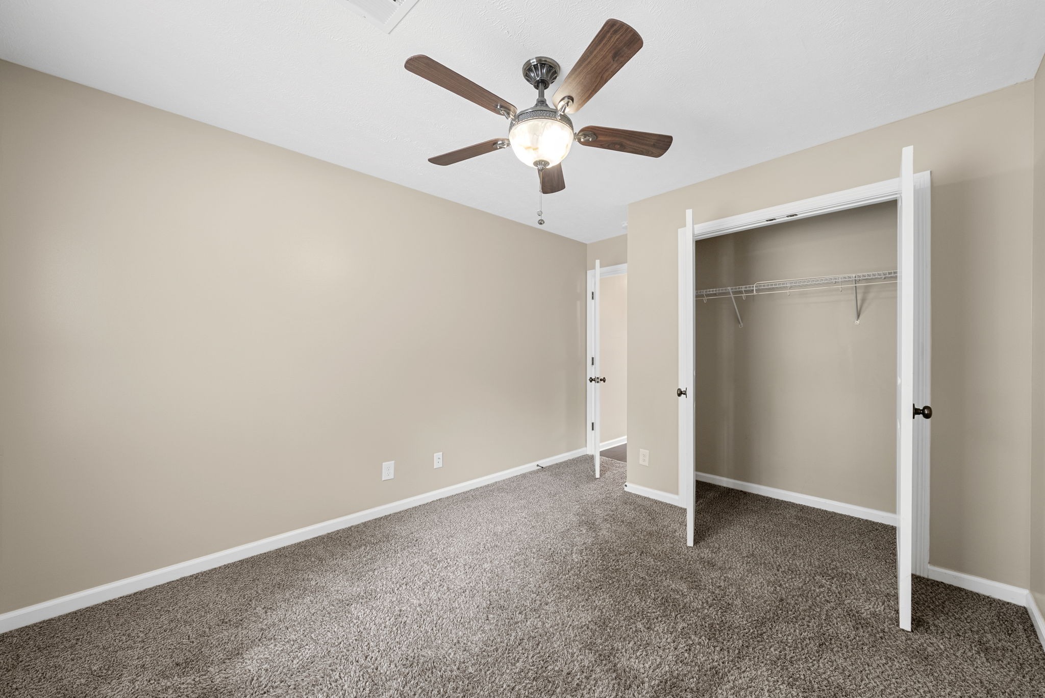 1227 Brigade Drive Clarksville, TN 37043 - Photo 25 of 39 an empty room with closet and ceiling fan