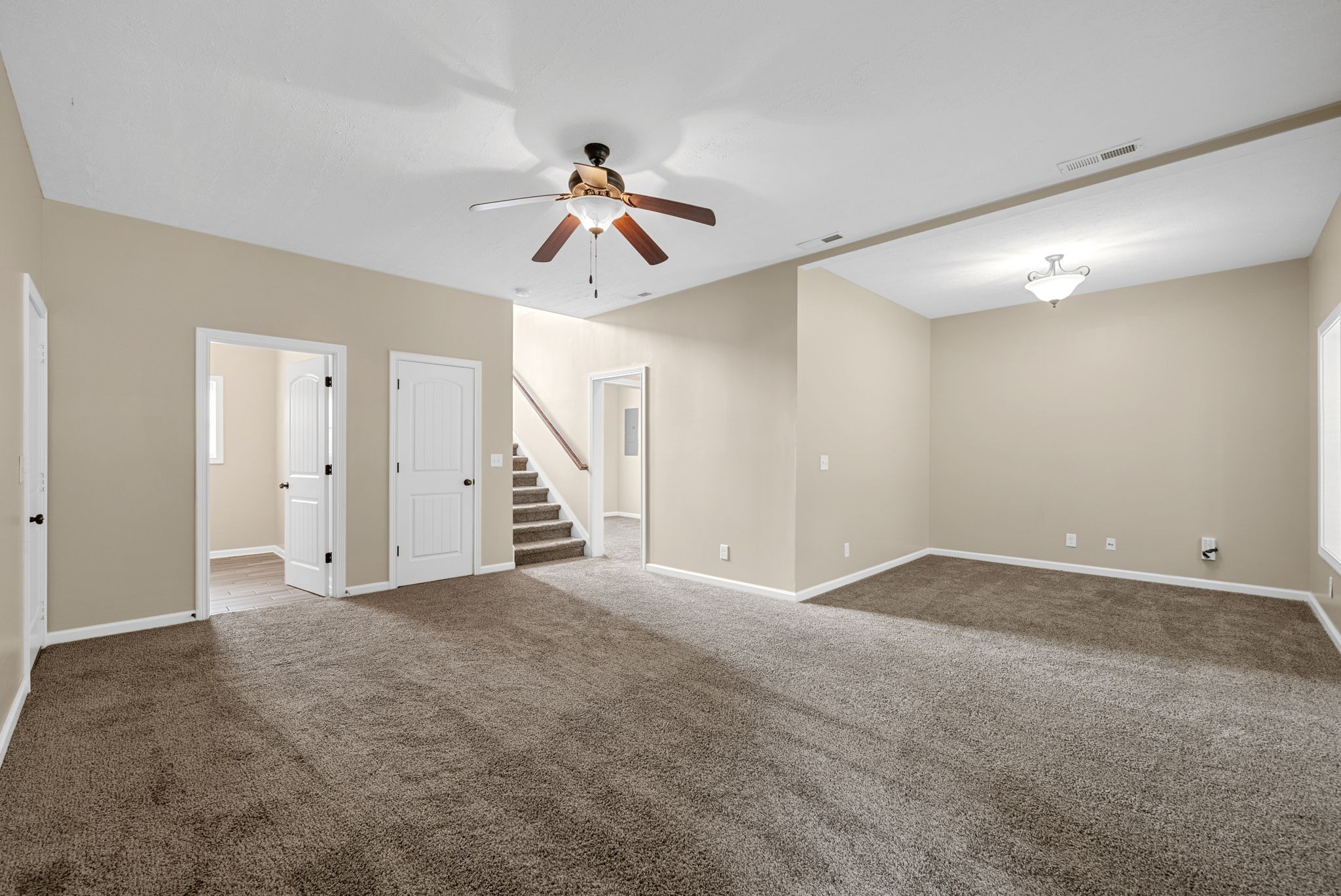 1227 Brigade Drive Clarksville, TN 37043 - Photo 28 of 39 a view of an empty room with a ceiling fan