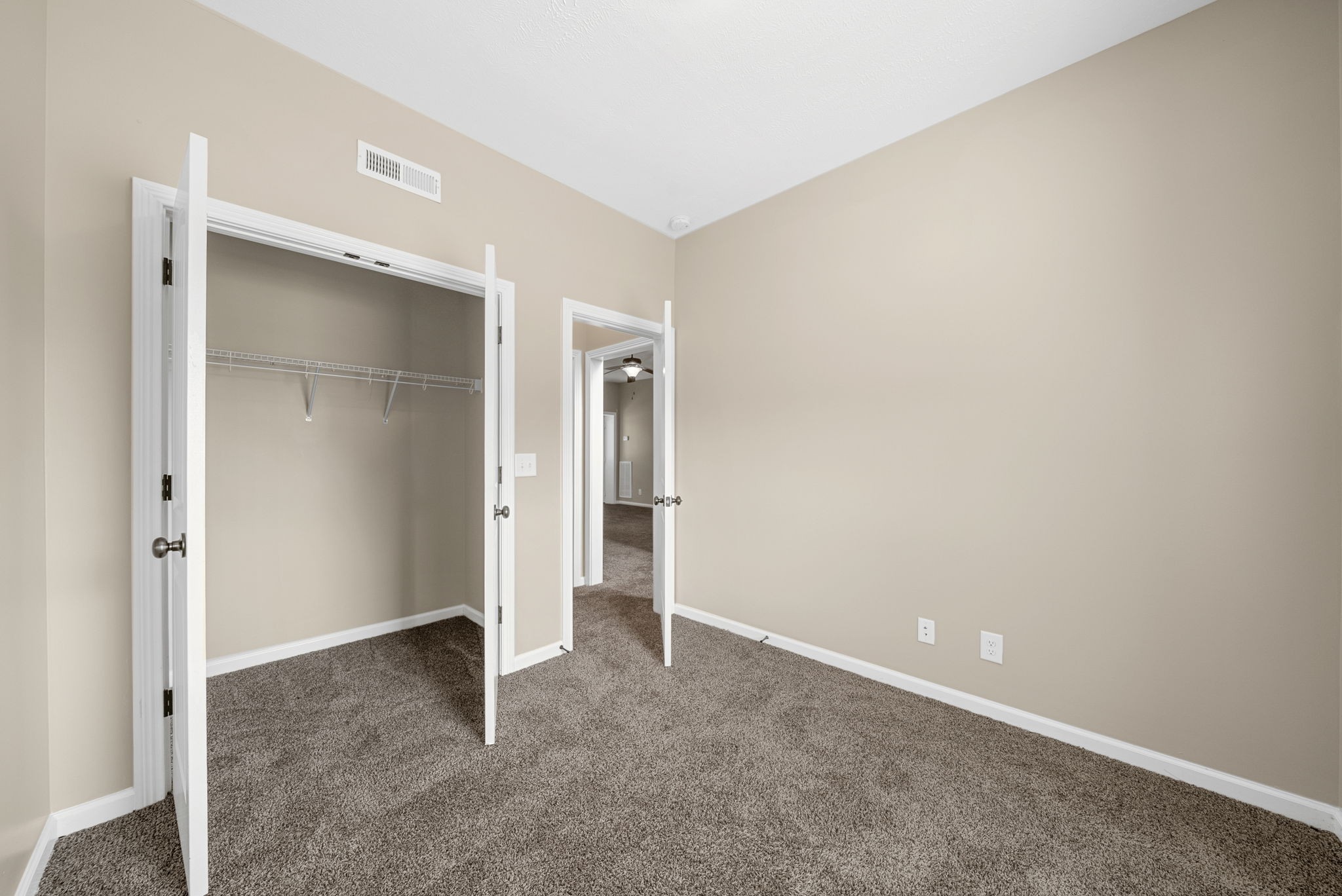 1227 Brigade Drive Clarksville, TN 37043 - Photo 32 of 39 an empty room with closet and a bathroom
