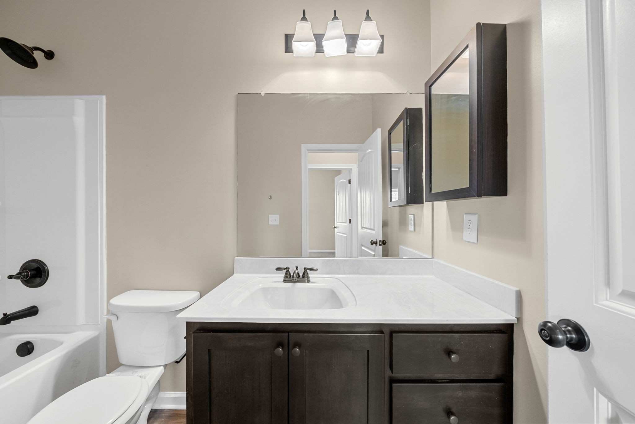 1227 Brigade Drive Clarksville, TN 37043 - Photo 33 of 39 a bathroom with a sink and a mirror