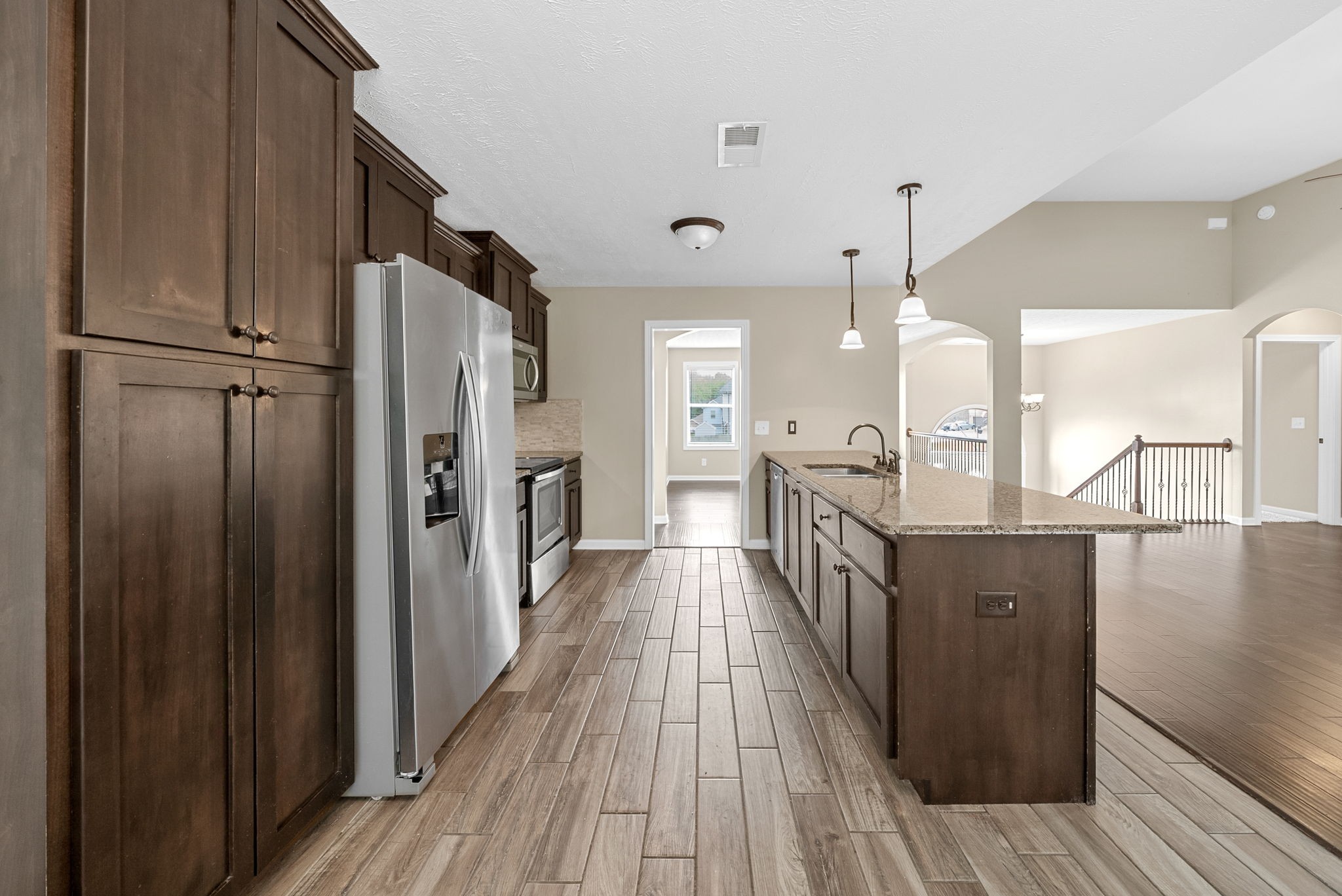 1227 Brigade Drive Clarksville, TN 37043 - Photo 10 of 39 a view of a kitchen from the hallway