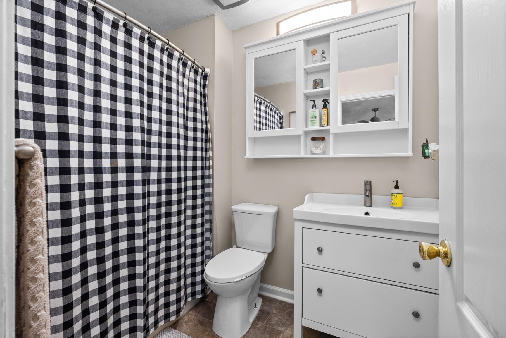 2640 Brighton-Clopton Road Brighton, TN 38011 - Photo 19 of 36 Bathroom featuring vanity, tile patterned flooring, and a shower with curtain