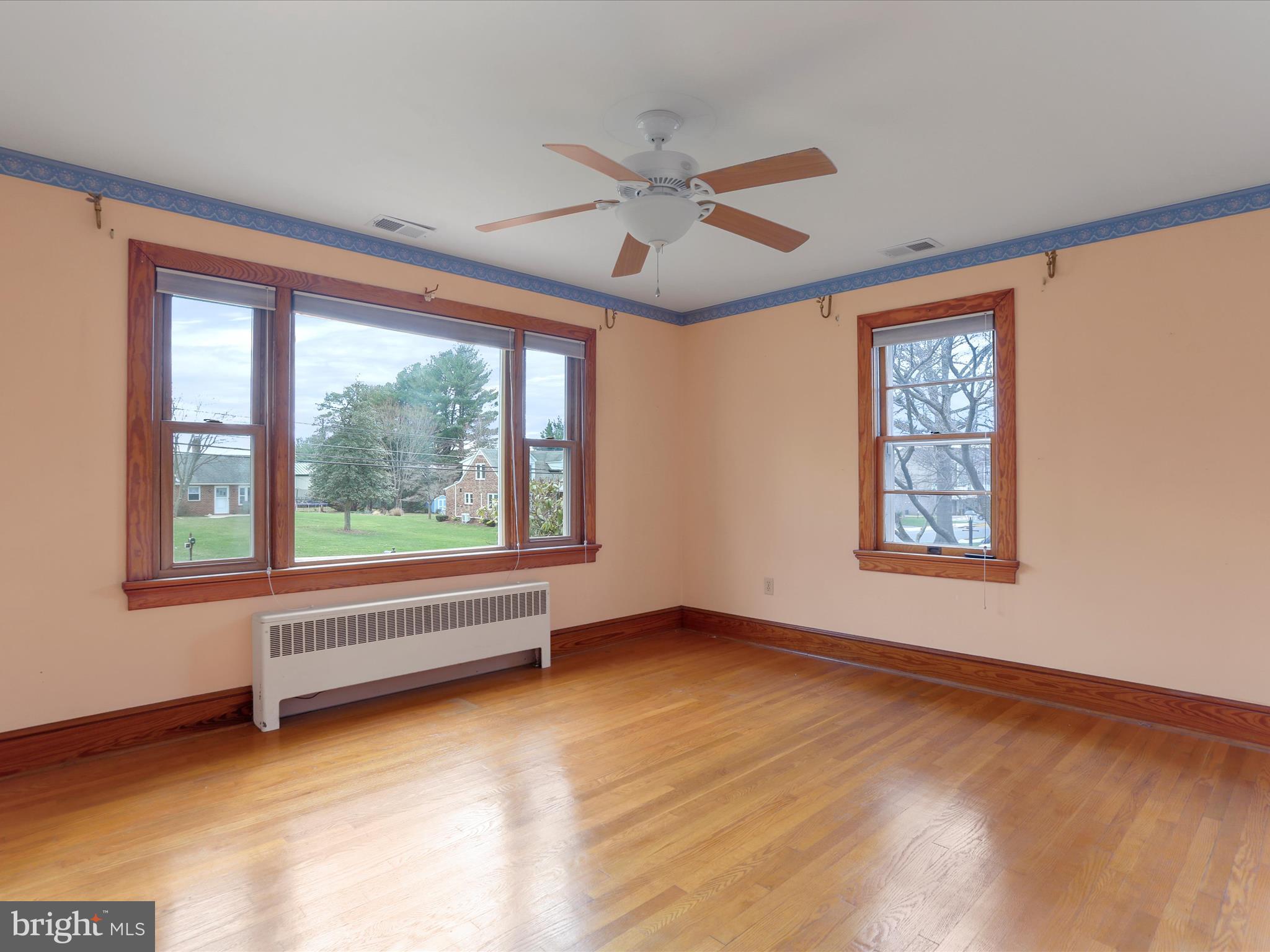 211 Broad Street Middletown, MD 21769 - Photo 11 of 35 a view of an empty room with a window