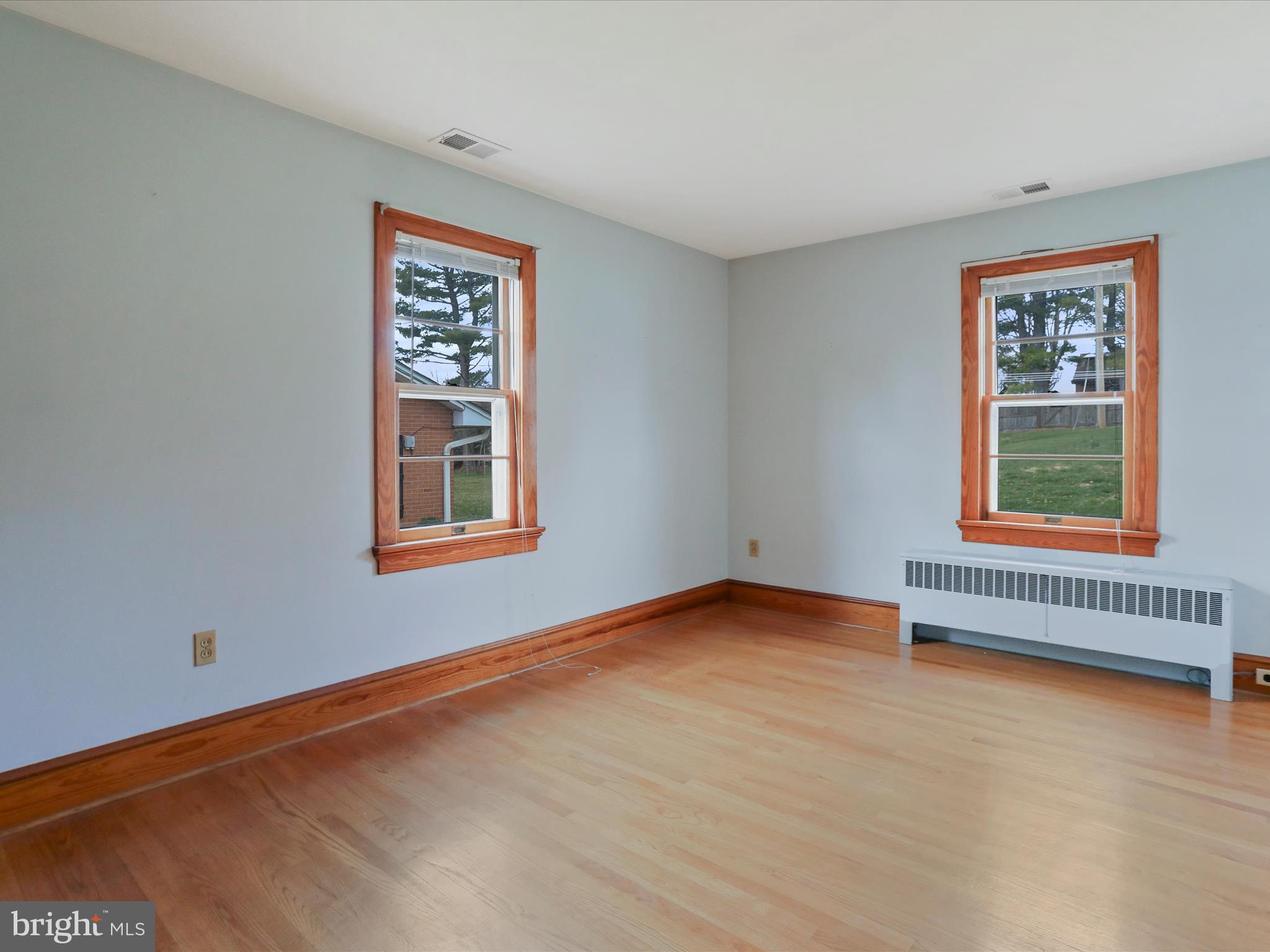 211 Broad Street Middletown, MD 21769 - Photo 16 of 35 a view of an empty room with a window