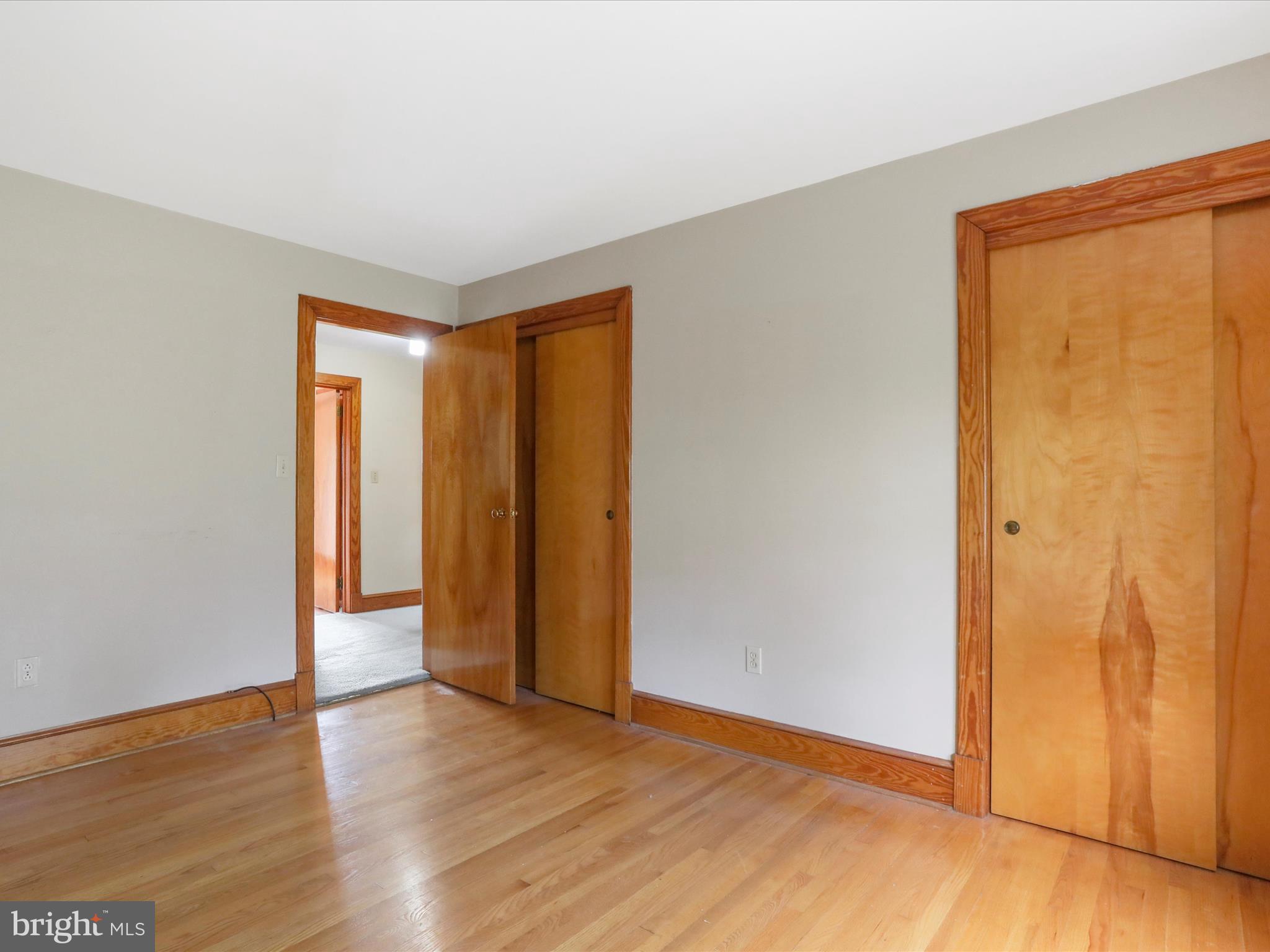 211 Broad Street Middletown, MD 21769 - Photo 20 of 35 an empty room with wooden floor and closet