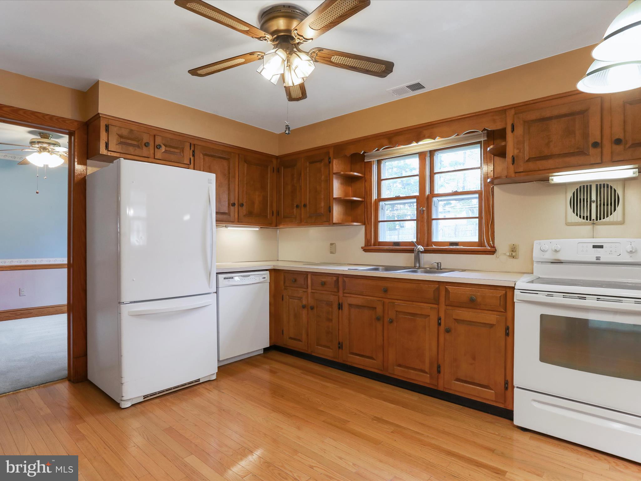 211 Broad Street Middletown, MD 21769 - Photo 22 of 35 a kitchen with stainless steel appliances sink and refrigerator