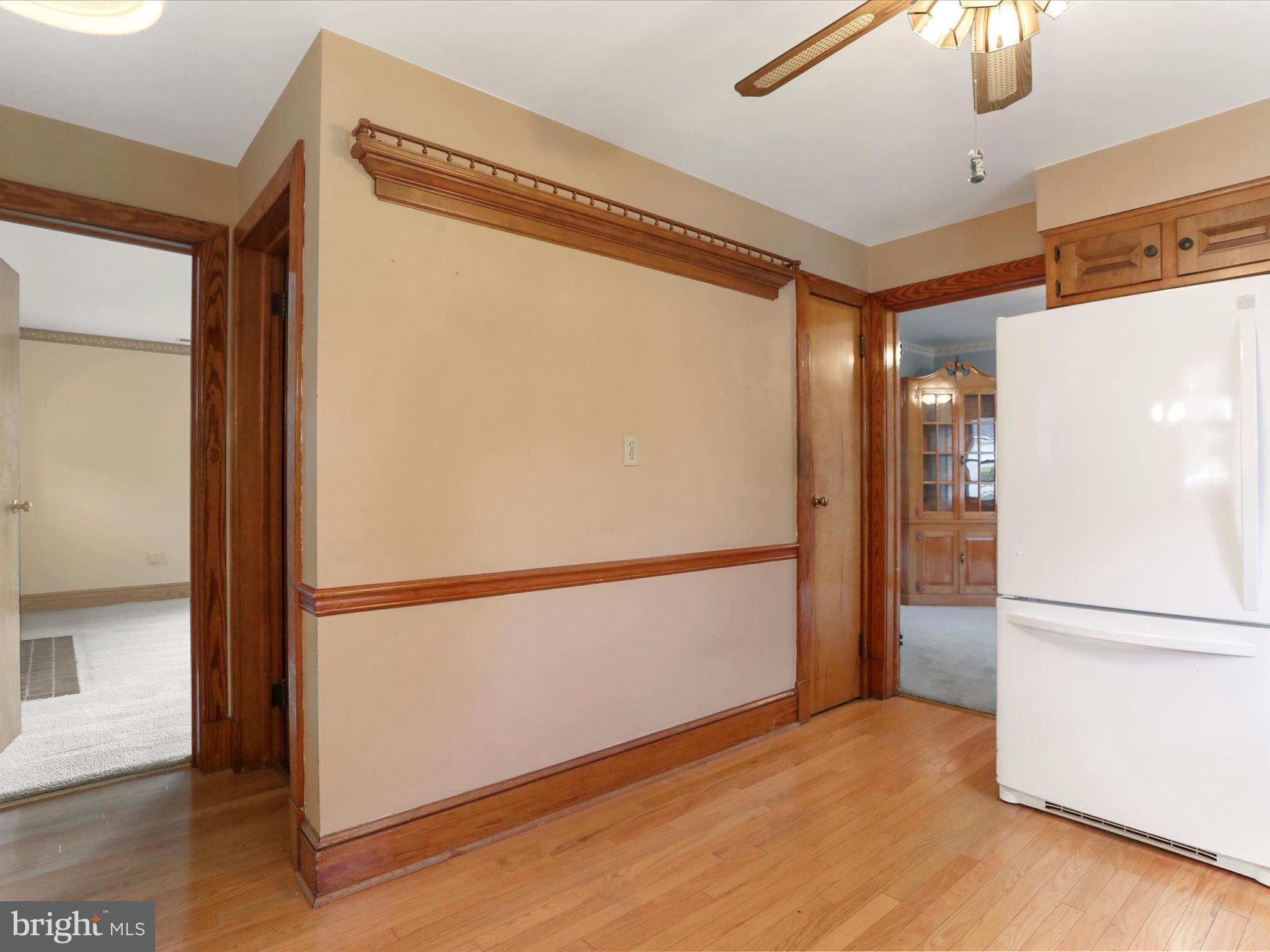 211 Broad Street Middletown, MD 21769 - Photo 24 of 35 a view of a kitchen with a refrigerator and a microwave