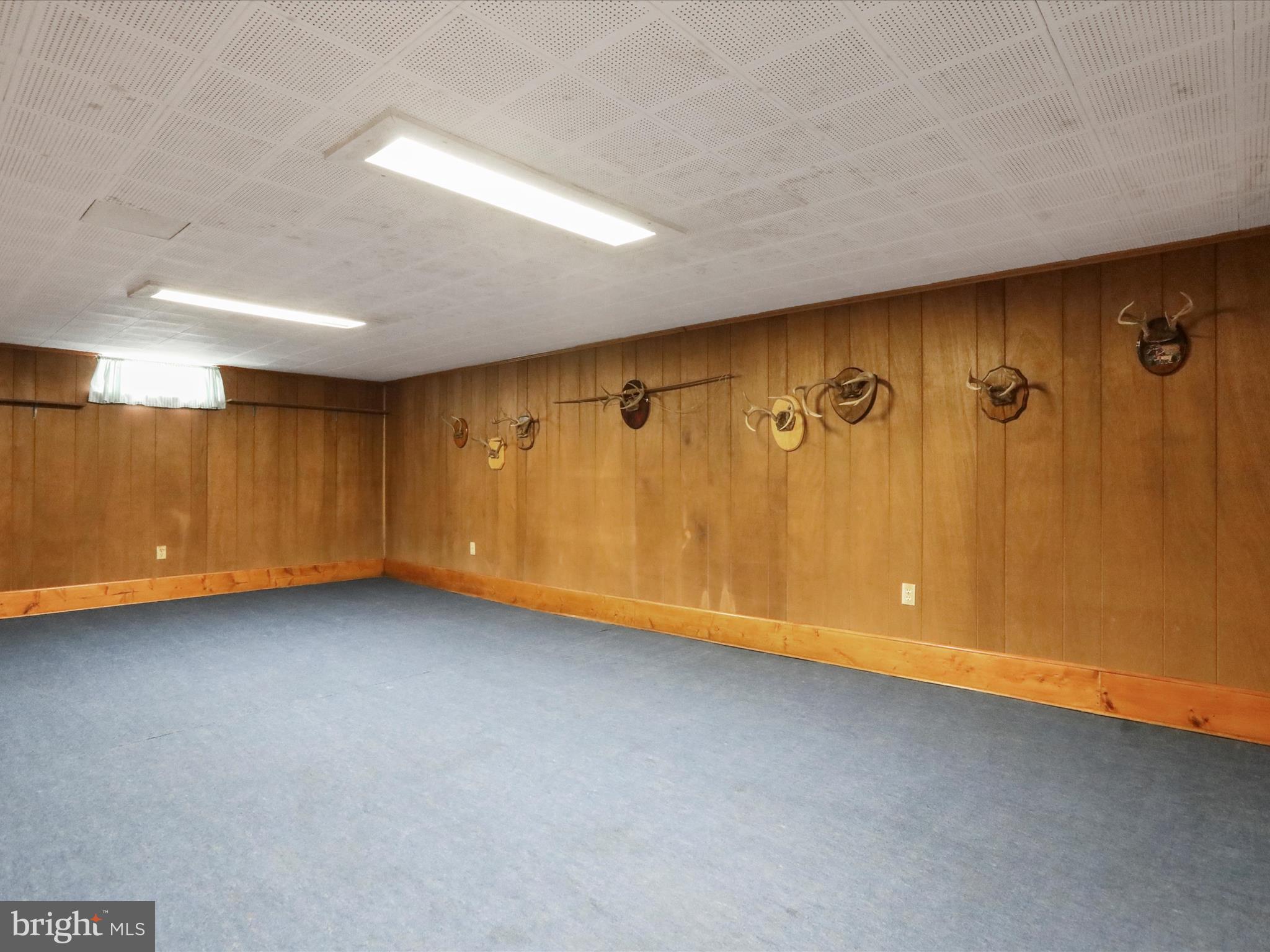 211 Broad Street Middletown, MD 21769 - Photo 26 of 35 a view of a livingroom with wooden staircase