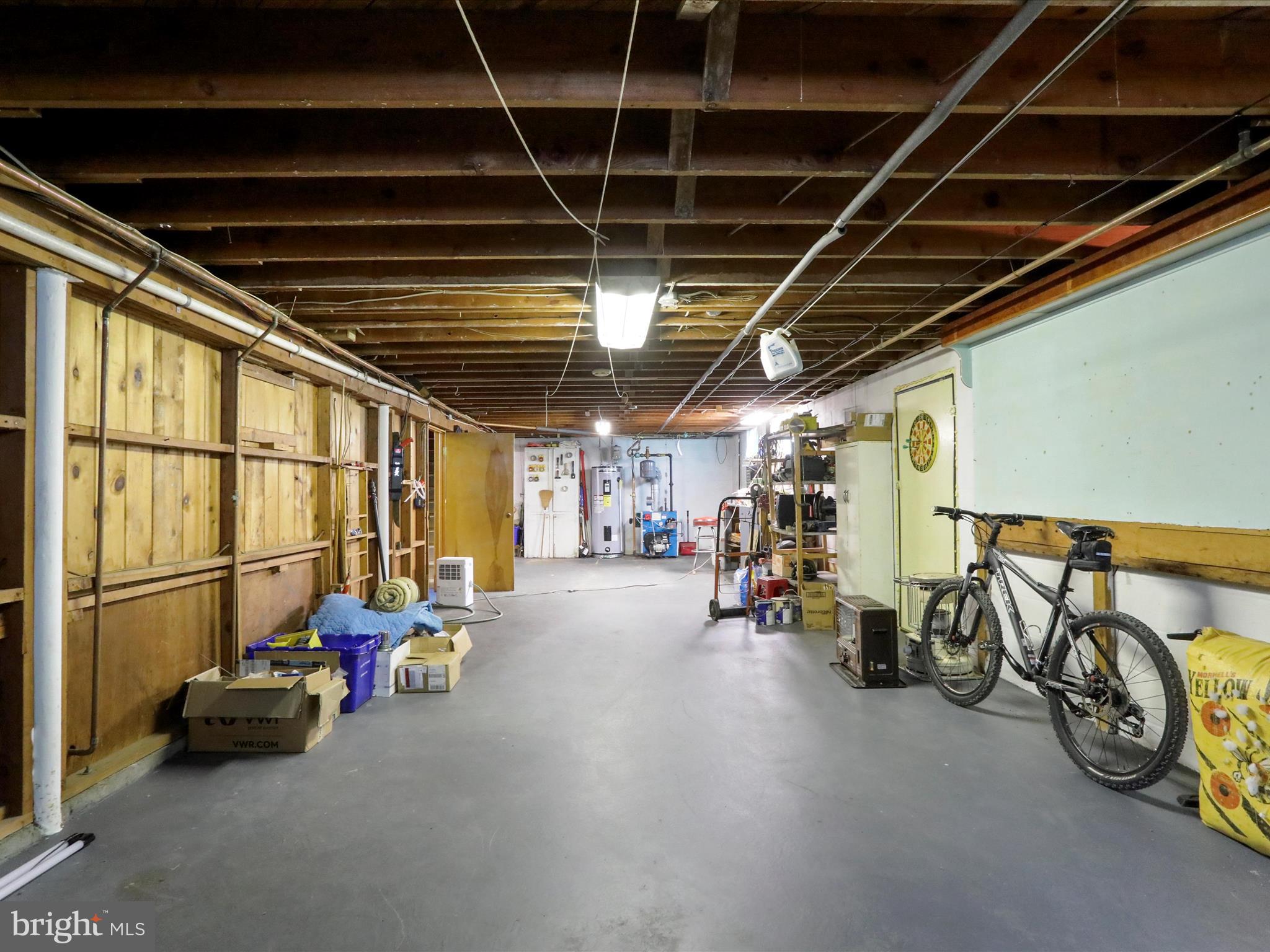 211 Broad Street Middletown, MD 21769 - Photo 31 of 35 a view of parking garage with cars