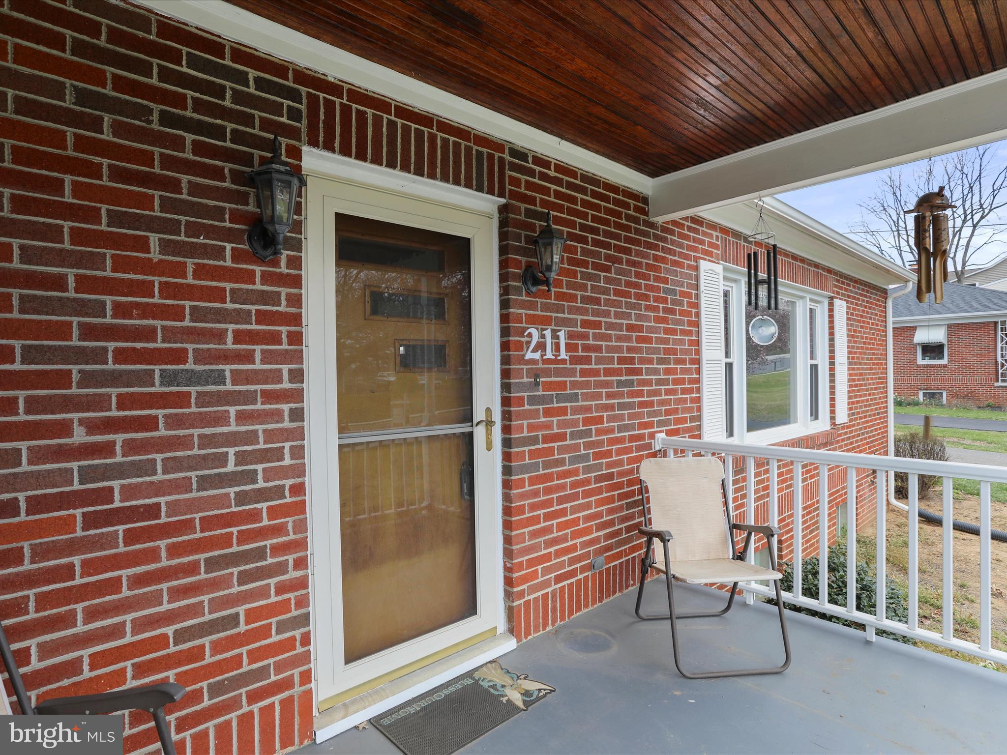 211 Broad Street Middletown, MD 21769 - Photo 5 of 35 a view of a door with a chair and door