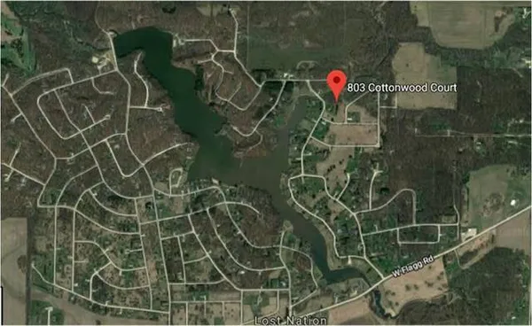 a bathroom with a shower and a mirror