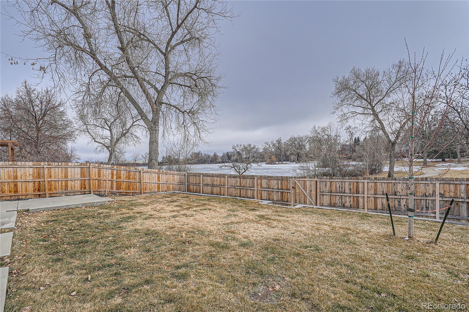 13158 West 62nd Drive Arvada, CO 80004 - Photo 28 of 35 a view of swimming pool with a yard