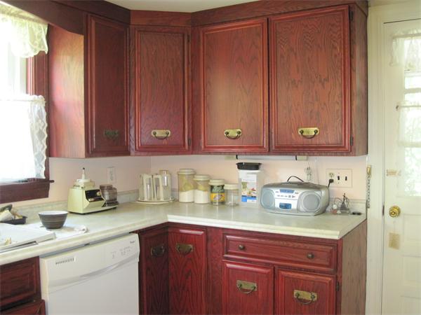 34 Evergreen Road Natick, MA 01760 - Photo 3 of 10 a kitchen with a sink cabinets and window