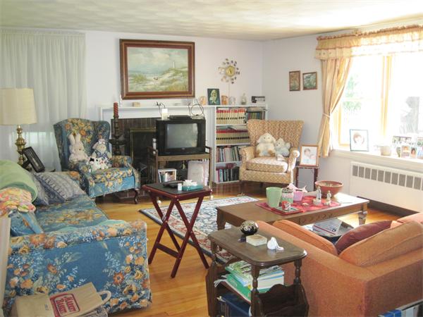34 Evergreen Road Natick, MA 01760 - Photo 5 of 10 a living room with furniture and a flat screen tv